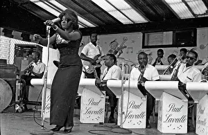 Singer Performing With Band