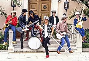 Singer Rod Stewart With His Band At Beverly Hills, California Home In 1985