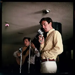 Singers Peter and Chris Allen Singing at Microphones