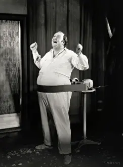 Bald Prints: Singing Man on an Exercise Machine