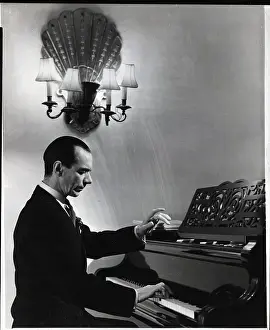 Popular Prints: Sir Malcolm Sargent Seated At Piano