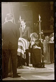 Sister of Robert F. Kennedy Kneeling Near His Coffin
