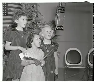 Sisters Singing Christmas Carols for War Efforts