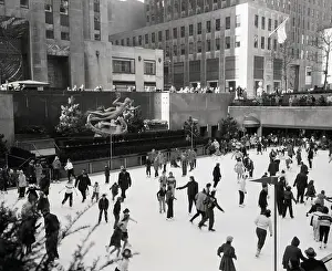 Ice Skating Prints: Skaters in Rockefeller Center in Winter