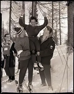 Shoulder Prints: Skier Carried on Teams Shoulders