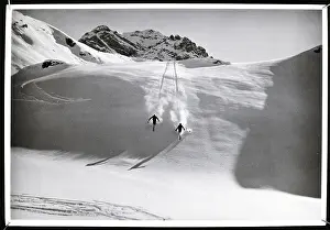 Skiing Prints: Two Skiers Race Downhill In Alps