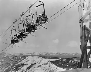 Skiers Riding Ski Lift