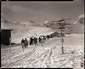 Skis Prints: Skiers Walking Down Hill Towards Base