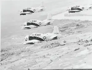 Skyraider Aircrafts Heading Toward Target