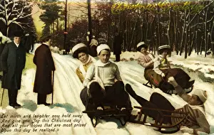 Prints of UNITED STATES - CIRCA 1910: A Christmas holiday greeting postcard features a sledding scene from about 1910. (Photo by Transcendental Graphics/Getty Images) Transcendental Graphics Prints: Sledding At Christmas