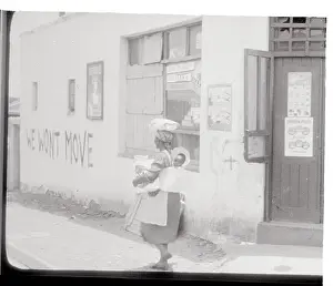 Johannesburg Prints: Slogan Painted on the Side of a Store