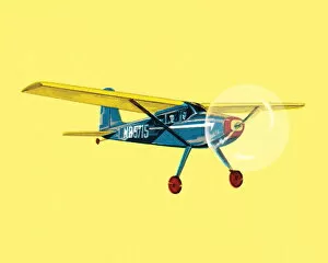 Images Dated 16th January 2015: Small Airplane on a Yellow Background