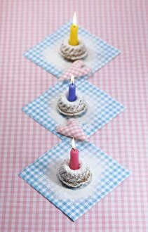 Three small birthday cakes