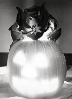 Pumpkin Prints: Small Child Stares In To Head Of Pumpkin