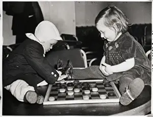 Checkers Prints: Small Children Playing Checkers