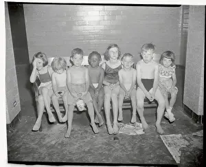Lost Prints: Small Children Sitting Huddled Together