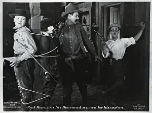 Tied Up Prints: Small Cowboy Catches Large Cowboy