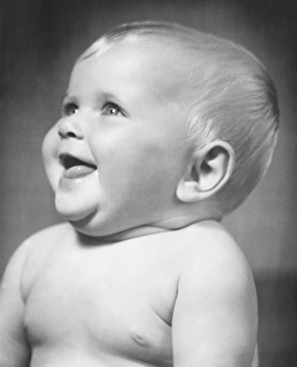Images Dated 5th April 2006: Smiling baby (6-12 months), (B&W), close-up
