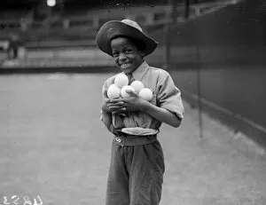 Fox Photo Library Gallery: Smiling Ball Boy