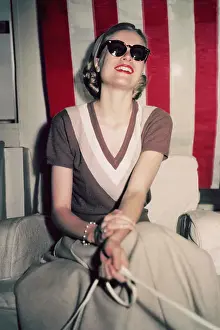 Smiling Grace Kelly in Sunglasses