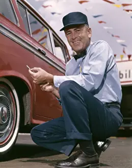 Only Mature Men Prints: Smiling Man, Service Station Mechanic Is Checking Tire Pressure