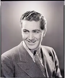 Smiling Man in Suit and Tie