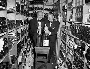 Waiter Prints: Two Smiling Waiters in Wine Cellar