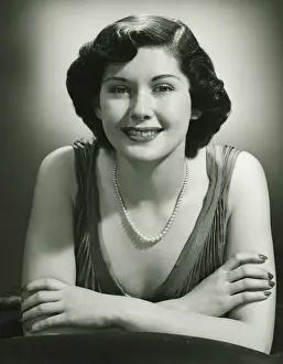 Pearls Prints: Smiling woman posing in studio, (B&W), (Close-up), (Portrait)