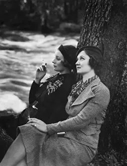 Tobacco Prints: Smoking Women Lean Against Tree