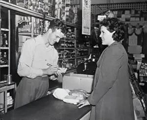 Stan Musial Prints: S.Musial Behind Counter In Grocery Store