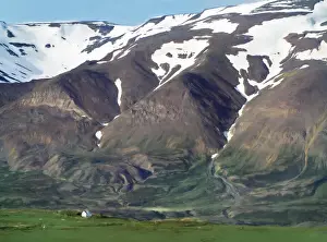 Vicki Jauron Wildlife Photography Prints: Snow-Capped Hills, Farm and Valley Outside Akureyri, Iceland
