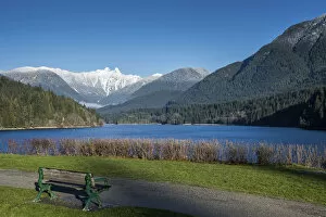 Images Dated 23rd January 2017: Snow-capped mountains above lake and meadow with bench, British Columbia, Canada