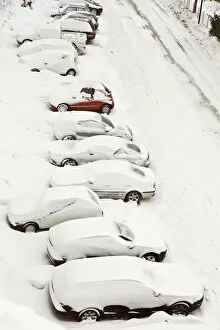 Snow-covered cars in Pienza, Tuscany, Italy, Europe