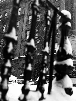 Prints of New York, NY - 1957: Snow and a Chinese laundry through the grates of a building in 1957 in New York City, New York Portraits, Artworks, and Montages from a Visionary Photographer: Snow Through Grates in 1957 Manhattan