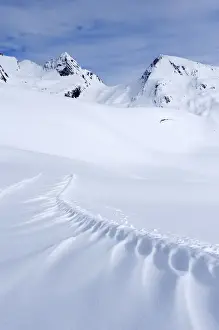 High Mountain Range Prints: Snowdrift on the panoramic hiking trail of Sennhuette-Schnydi