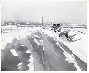 Snowplow Clearing Road in Minnesota