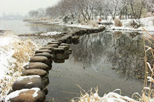 Snowscape of a stone path on the West Lake in Maojiabu village, Hangzhou, Zhejiang, China