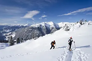 Hike Prints: Snowshoe walkers during the ascent of the Mt Morgenrast summit from Unterreinswald