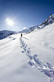 Images Dated 8th December 2011: Snowshoer ascending to Jagelealm alpine pasture in Ridnauntal Valley above Entholz, Alto Adige
