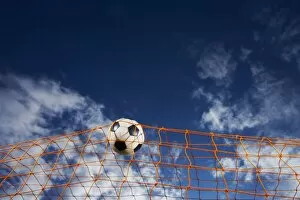 Images Dated 28th July 2008: Soccer Ball Going Into Goal Net