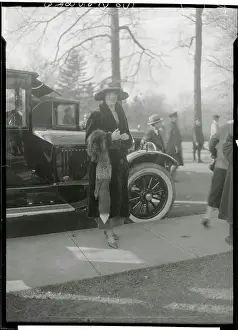 Socialite Laura Biddle Posing by Automobile
