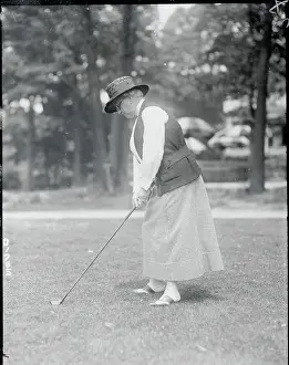 Socialite Mrs. Caleb Fox Playing Golf
