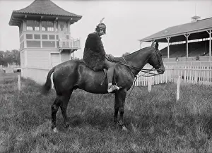 Socialite Pausing Atop Horse