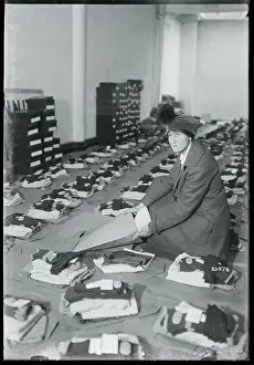 Caring Prints: Society Girl Filling Kits for Soldiers