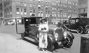 Society Woman Posing Beside Car