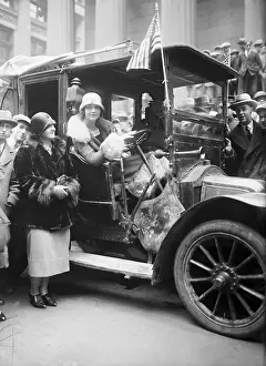 Society Women Posing at Taxi During Wall Street Celebration