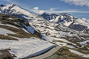 Incidental People Collection: Sognefjellsvegen, road between Sognefjord and Lom, Jotunheimen, Hurrungane Mountains at the back