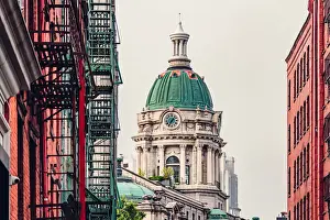 Soho district fire escapes with distant view of Neo-classical building in lower Manhattan