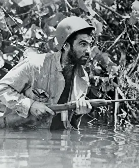 New Britain Prints: Soldier Advancing Through Swamp