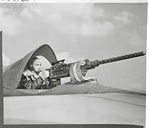 Portland Prints: Soldier Aiming Gun in Airplane